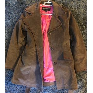 Olive/brownish coat with pink stitching
